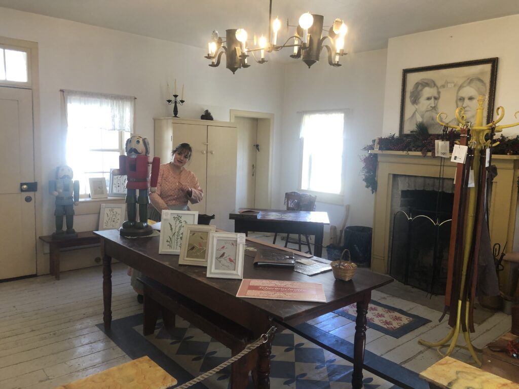 Woman painting at the Fairbanks home