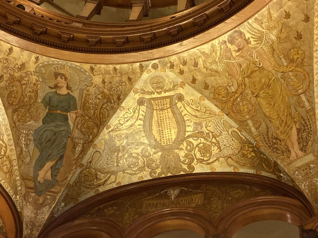 Vintage painted gold arch ceiling with two women