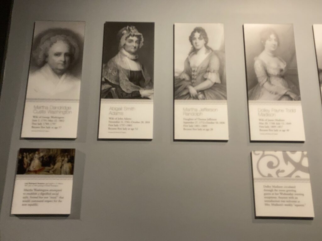 Pictures of First Lady on Brown wall