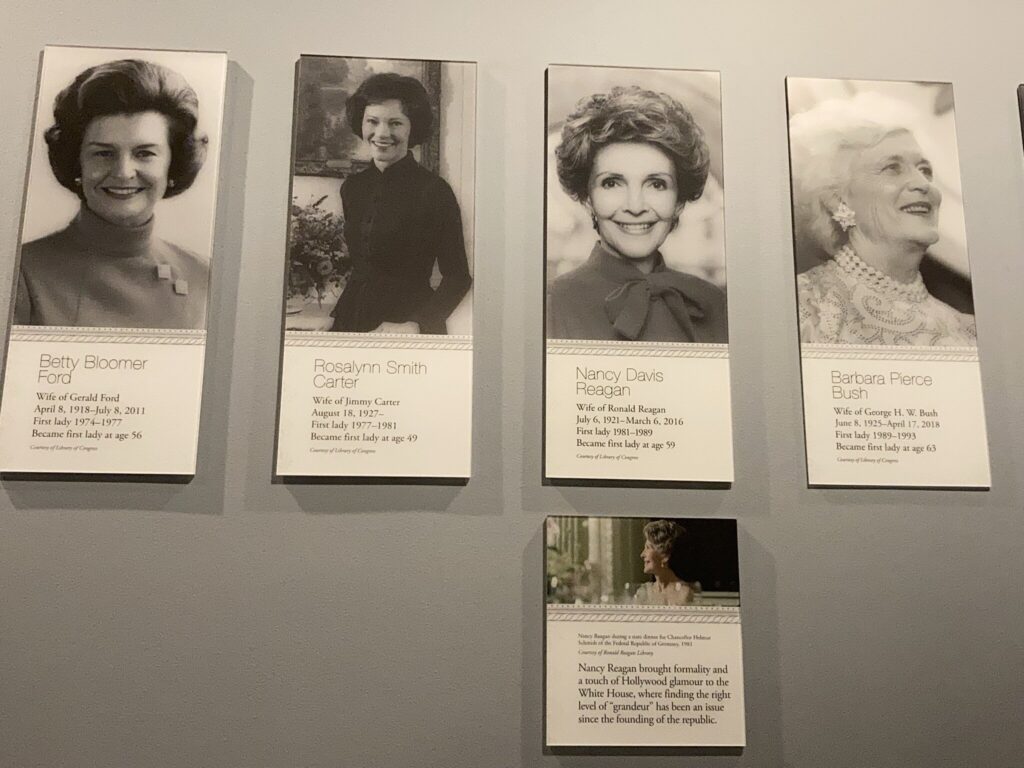 Pictures of First Lady on Brown wall