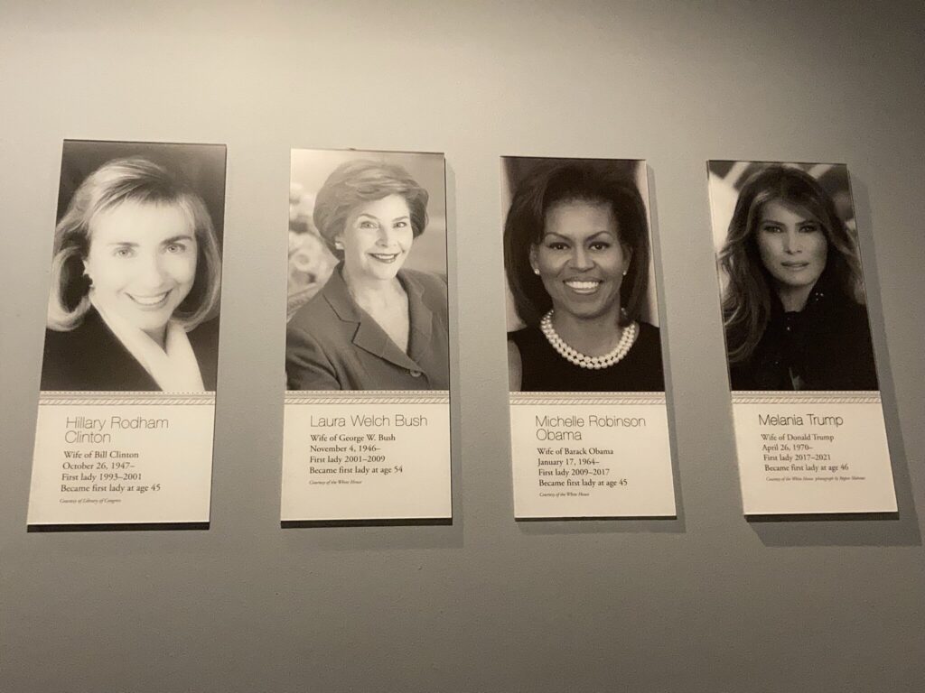 Pictures of First Lady on Brown wall