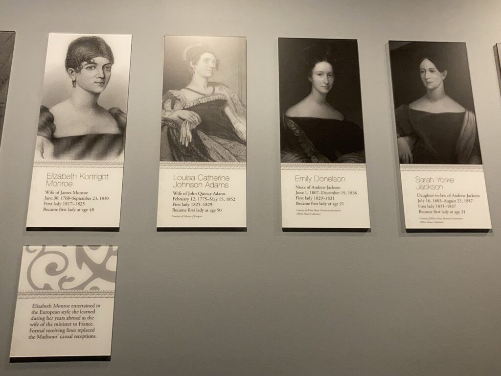 Pictures of First Lady on Brown wall