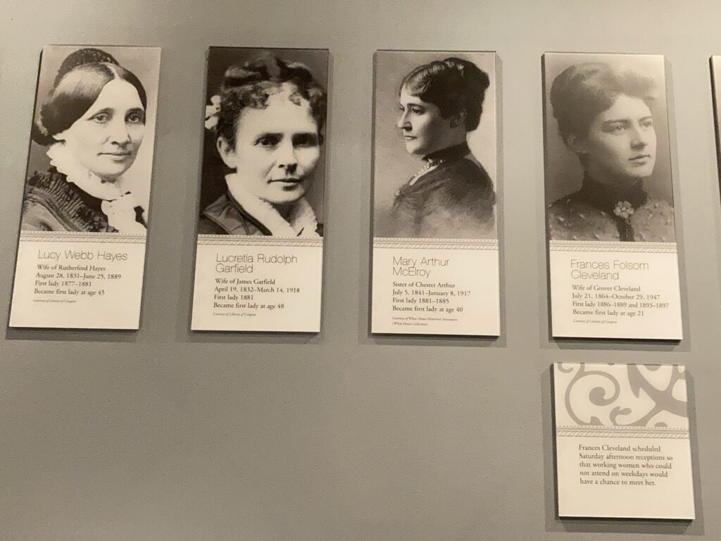 Pictures of First Lady on Brown wall