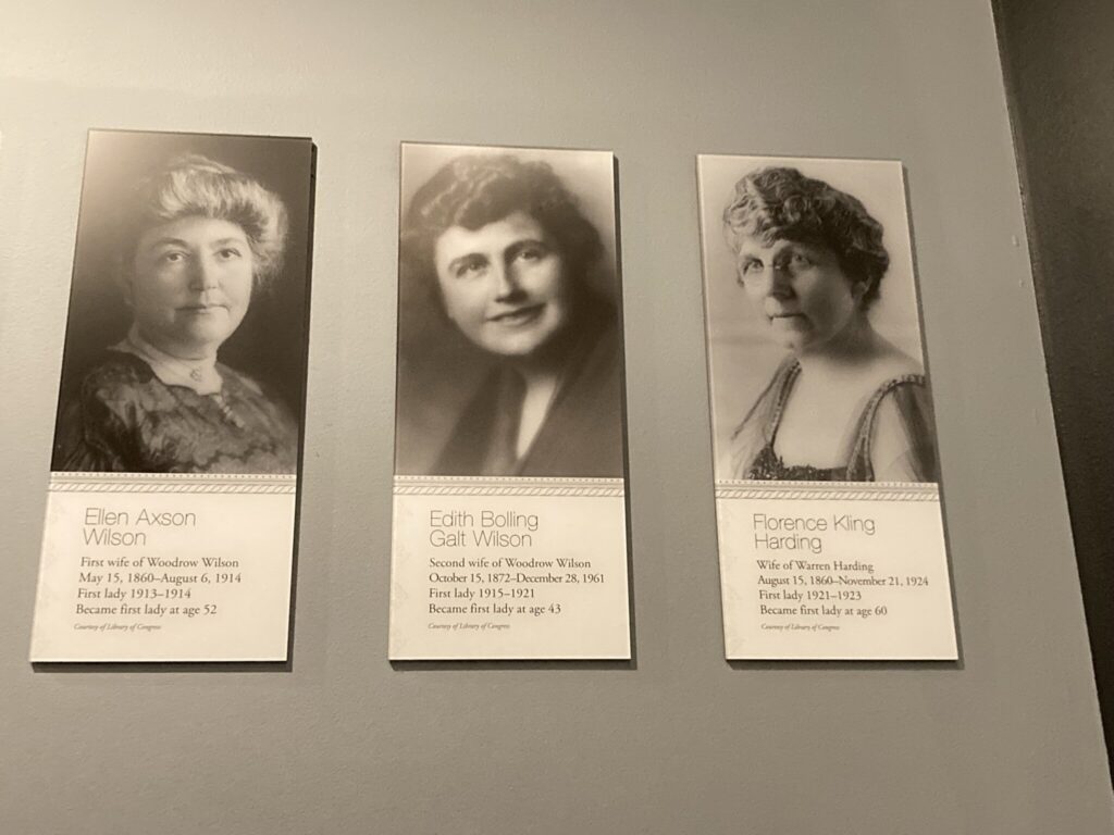 Pictures of First Lady on Brown wall