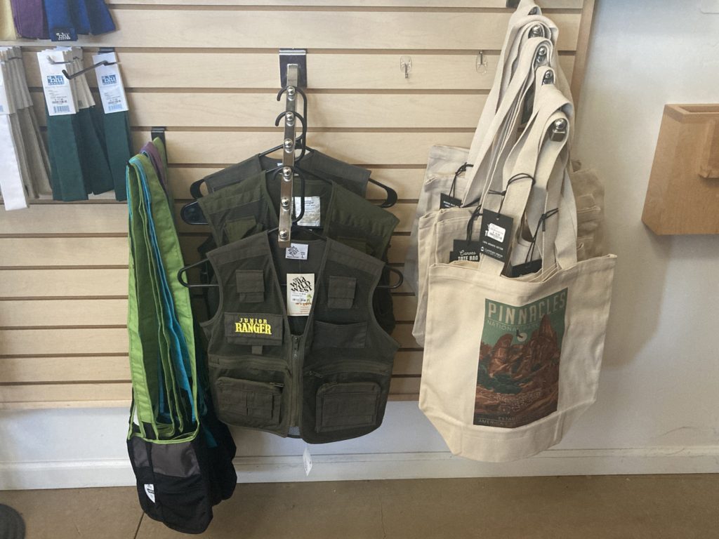 Vests and Tote Bags on Display