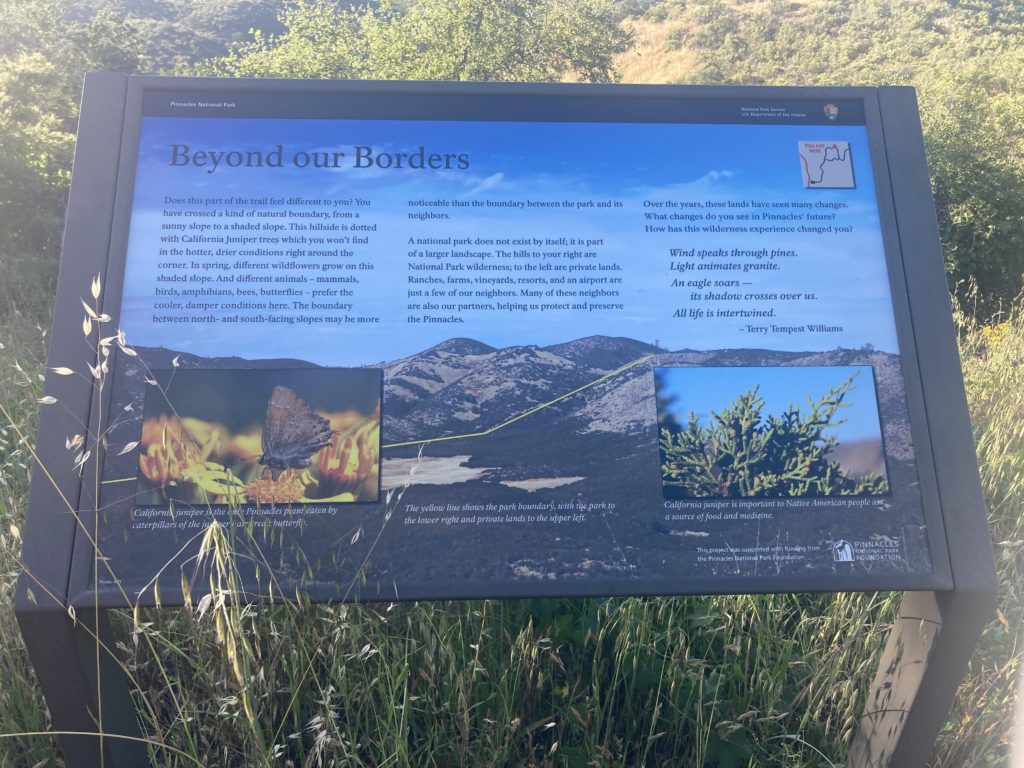 Blue Framed "Beyond our Borders" Information Placard
