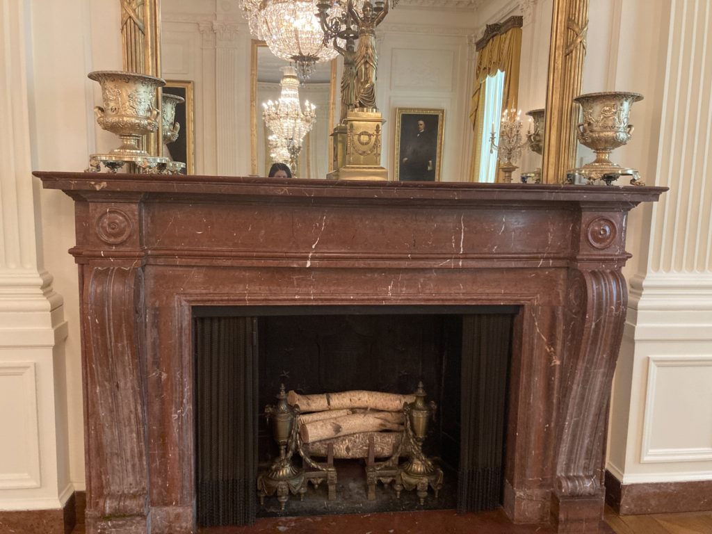 Brown Fireplace with Woods in it
