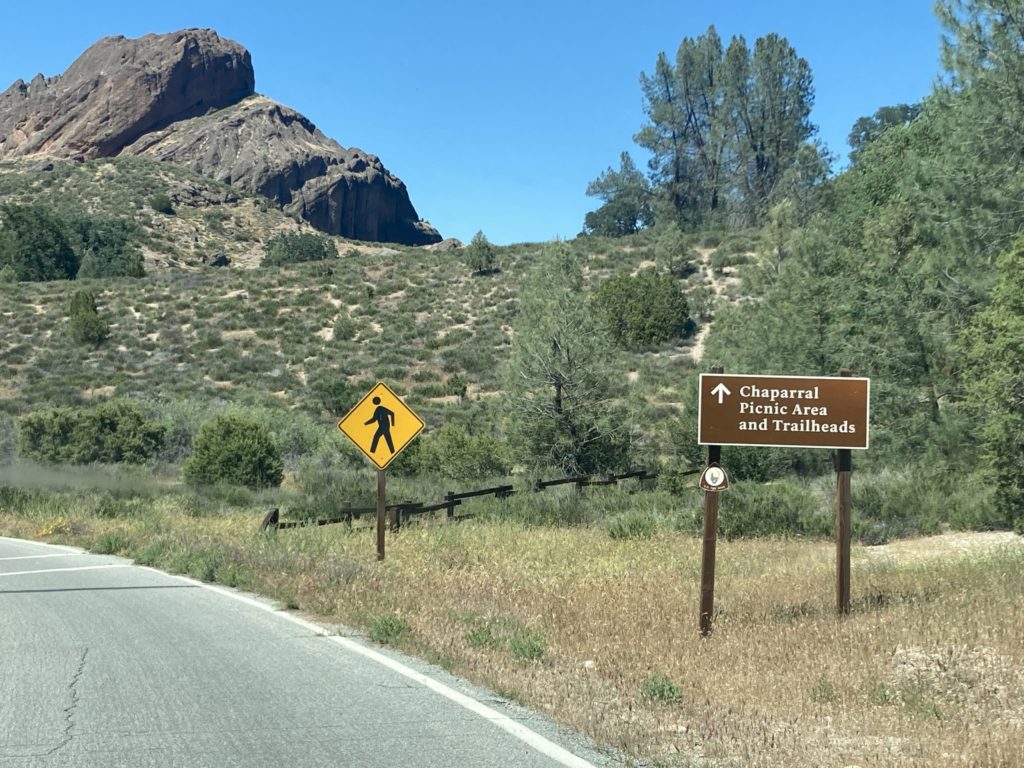 Chaparral Picnic Area and Trailheads Signboard with Rock Formation and Trees in the background