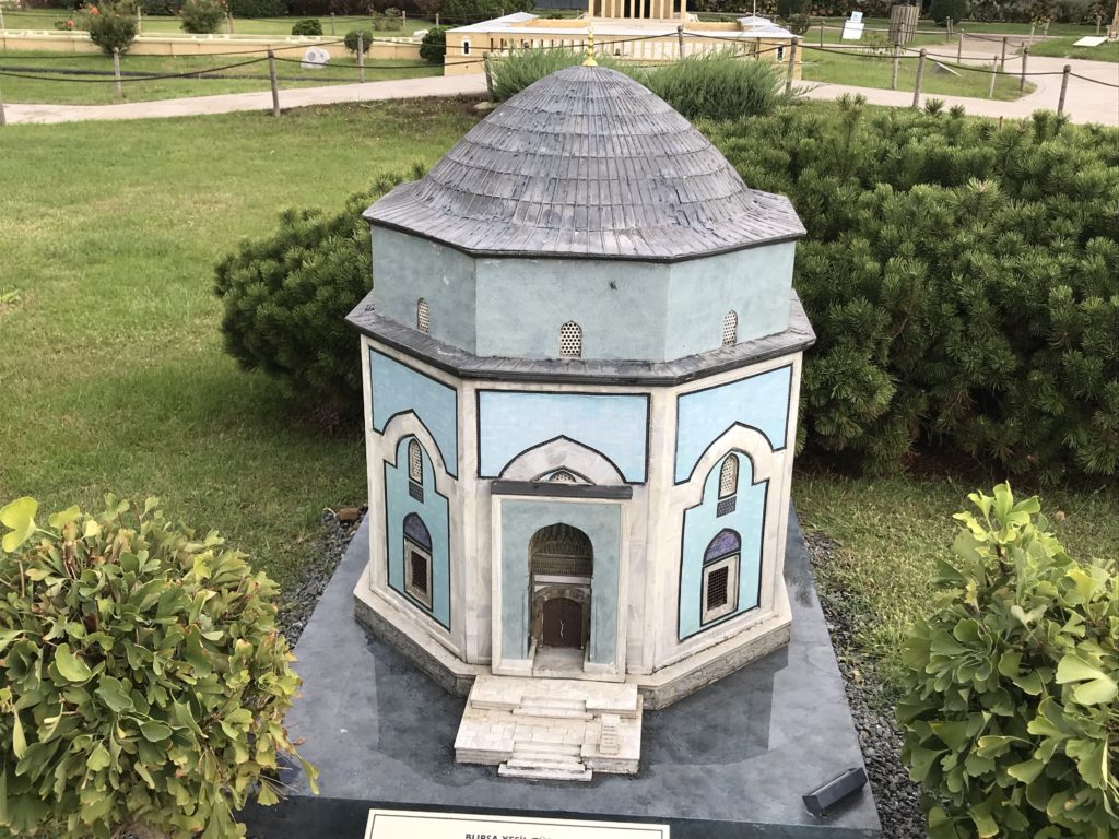Blue and White Tower Building with Grey Roof Miniature
