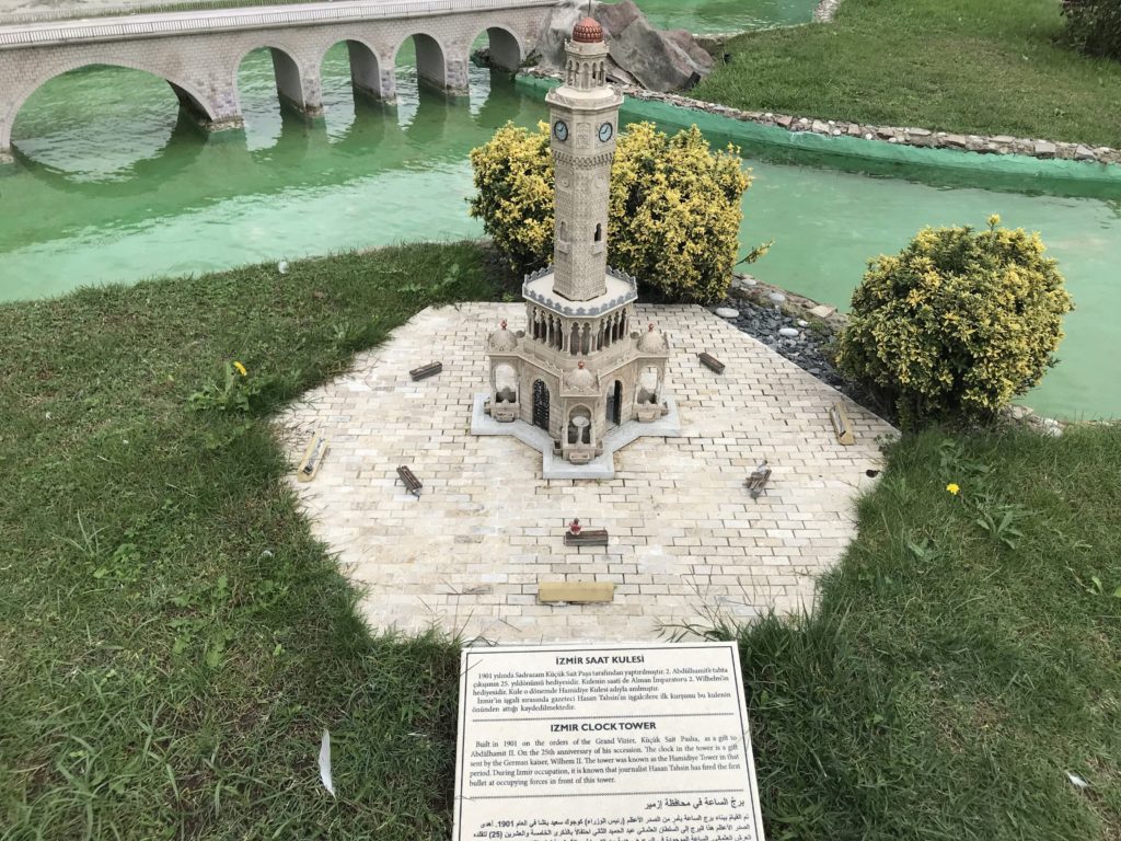 İzmir Clock Tower Miniature in the ground near the water