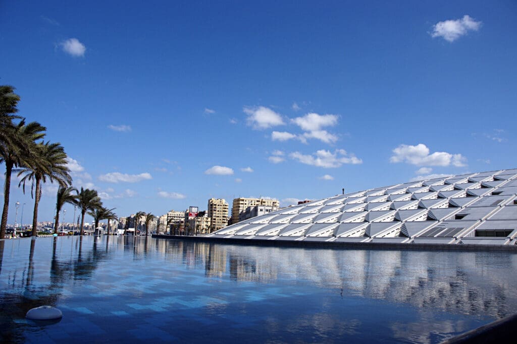 The Library of Alexandria is shaped like the sun rising out of the Mediterranean Sea
