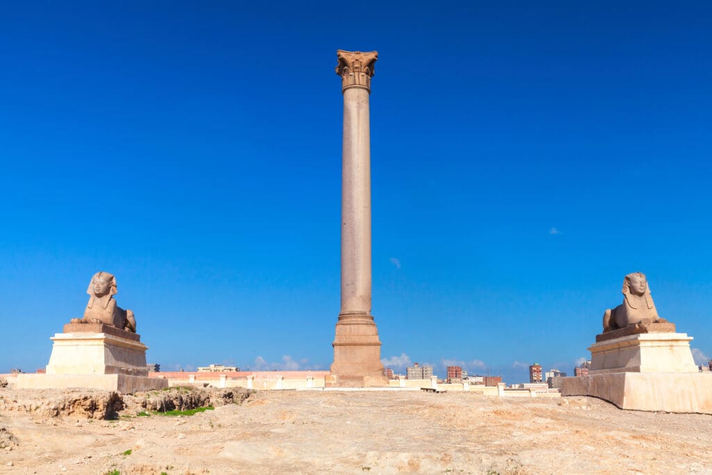 Pompey's Pillar is flanked by 2 sphinxes